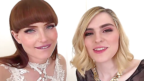 Blonde girl takes the dick of another brunette and fucks her