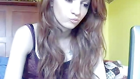 Amateur solo video with a woman wearing a white dress