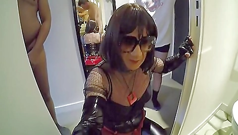 Shemale with latex panties plays with a guy's dick