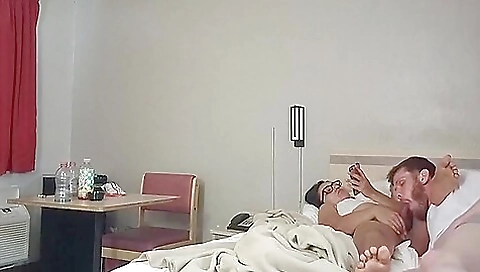 A cute brunette gets her mouth stuffed with a dick