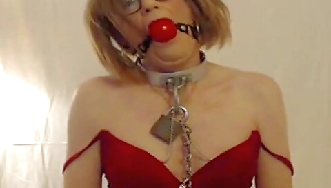 Busty redhead with a mouth full of cum plays with her own man