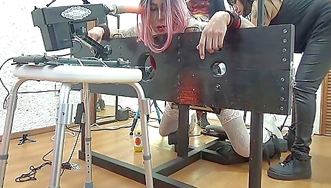 Busty brunette with big dildo in mouth and a huge dildo